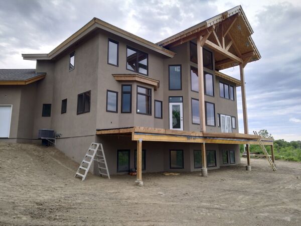The finished stucco exterior of the same house